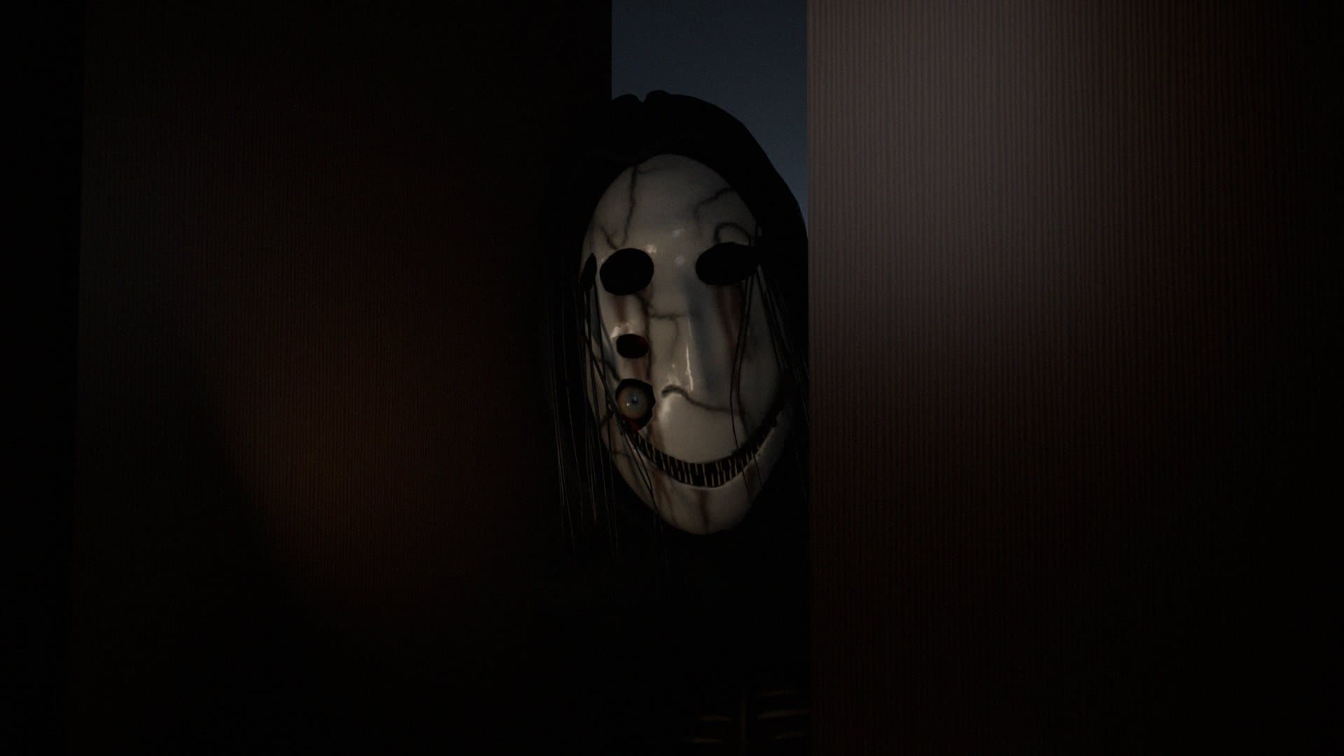 Store art: the Warden's mask in the gap of a dark wardrobe.